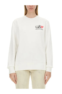White Moschino Jeans women’s sweatshirt with black and pink embroidered peace sign and heart logo on the chest