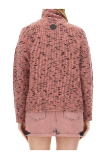 A cozy pink and black speckled knit sweater with a high turtleneck collar for women by Moschino Jeans