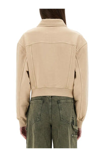 Beige cropped denim jacket with collar and ribbed cuffs from Moschino Jeans women’s urban jacket collection