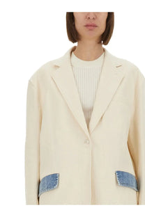 Cream-colored Moschino Jeans womens urban blazer with denim patch pockets perfect for casual wear