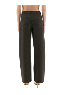 Dark olive moschino jeans women’s wide leg pants with subtle textured weave and tailored back pockets shown from back