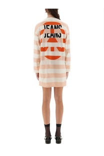 Back view of moschino jeans women’s wool mini dress in cream and peach stripes with bold orange jeans jeans logo