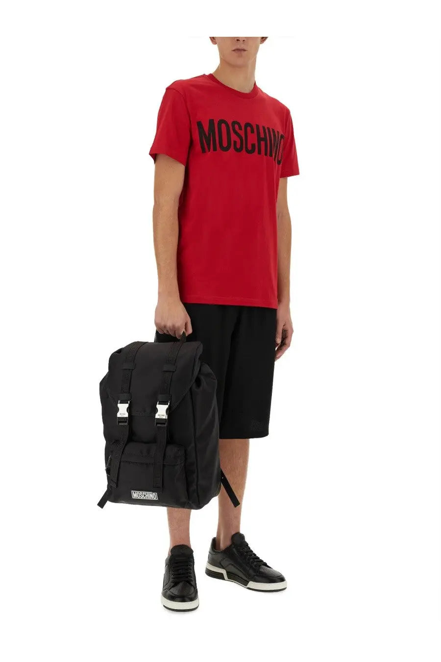 Moschino men’s Bermuda black backpack with silver-tone buckles and front patch logo in leather material
