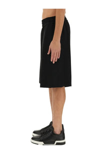 Moschino men’s bermuda black shorts with elastic waistband and mid-thigh length in soft fabric