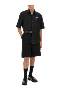 Moschino men’s Bermuda black short-sleeved button-up shirt with white logo embroidery on the chest