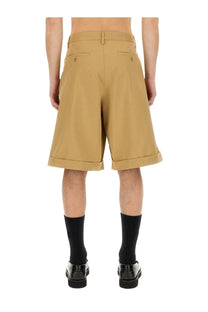 Moschino men’s bermuda cargo beige tan pleated shorts with rolled cuffs and gold-tone button details