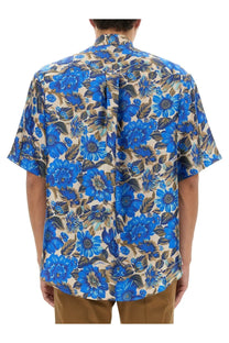 Moschino men’s blue floral short-sleeved shirt with beige background and detailed leaf patterns multicolor print
