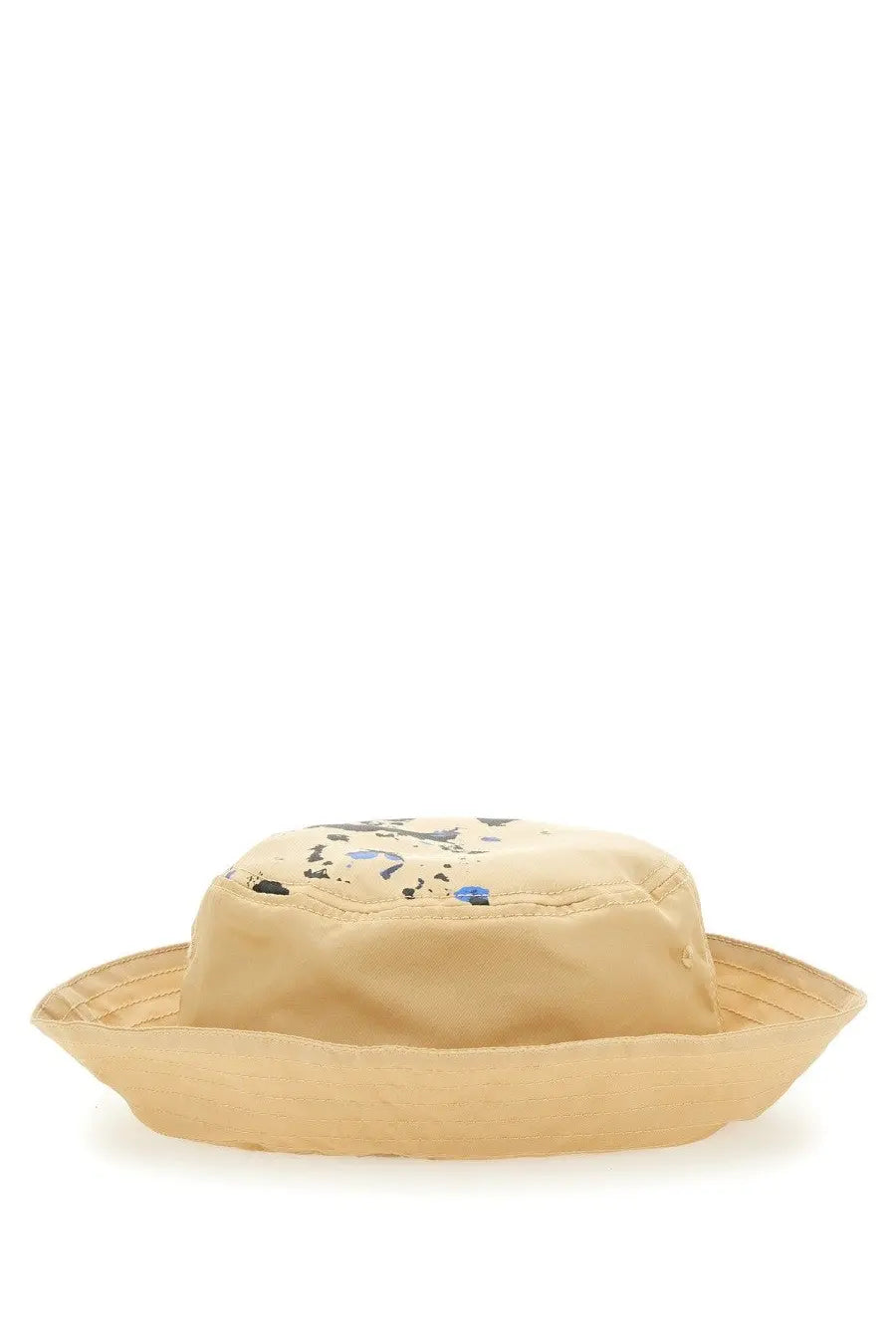 Moschino men’s beige canvas bucket hat with playful black and blue splatter paint design