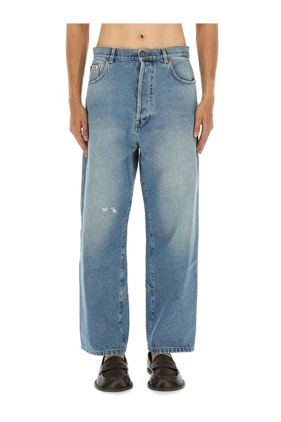 Moschino men’s cotton denim jeans in blue with a relaxed wide-leg cut and subtle thigh distressing