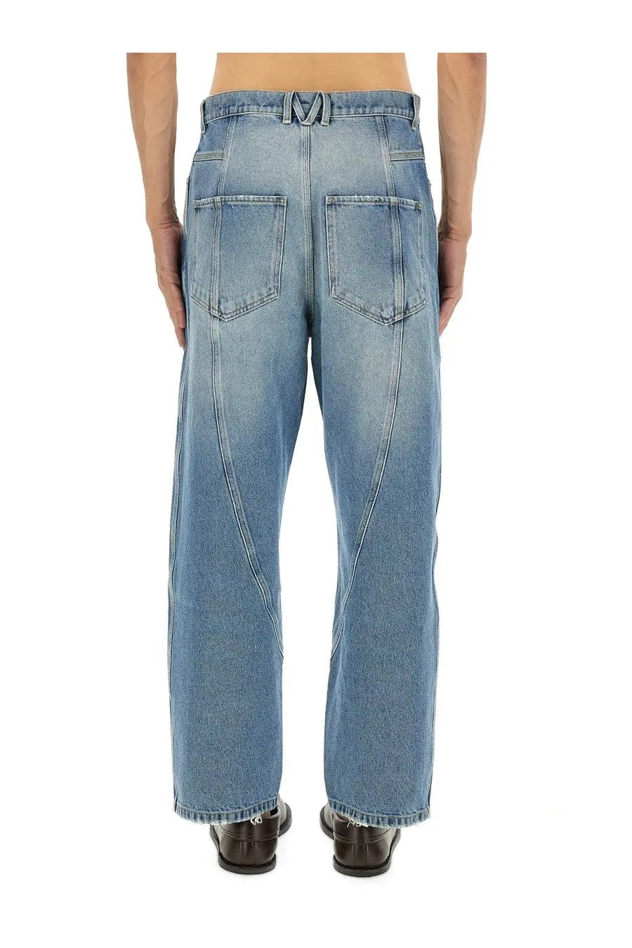 Moschino men’s blue cotton denim jeans with light-wash, relaxed wide-leg cut and visible stitching details