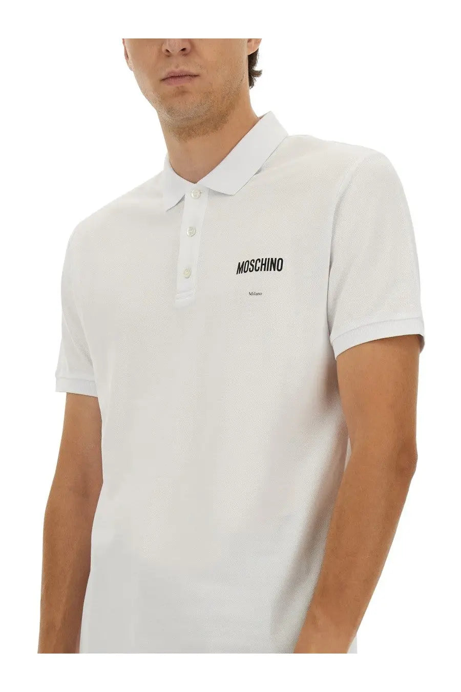 Moschino men’s white cotton pique polo shirt with black embroidered branding on the chest