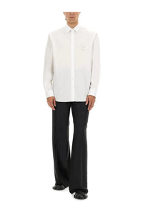 Moschino men’s white cotton poplin shirt with long sleeves button-up front and subtle embroidered logo on left chest