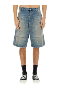 Moschino men’s distressed blue denim shorts with a relaxed fit and multiple pockets