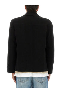 Moschino men’s black wool-blend double breasted blazer with structured collar and patch pockets worn over white shirt