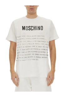 White Moschino men’s t-shirt featuring bold black lettering in a playful typographic design
