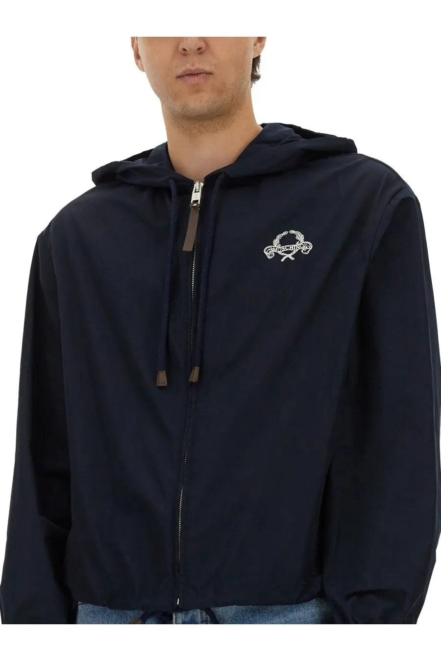 Navy blue Moschino men’s nylon hooded zip-up jacket with white embroidered logo on the chest