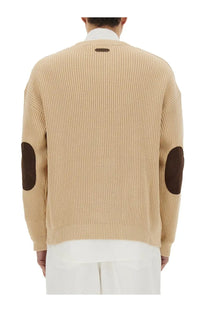 Moschino men’s beige ribbed knit organic cotton blend cardigan with dark brown elbow patches