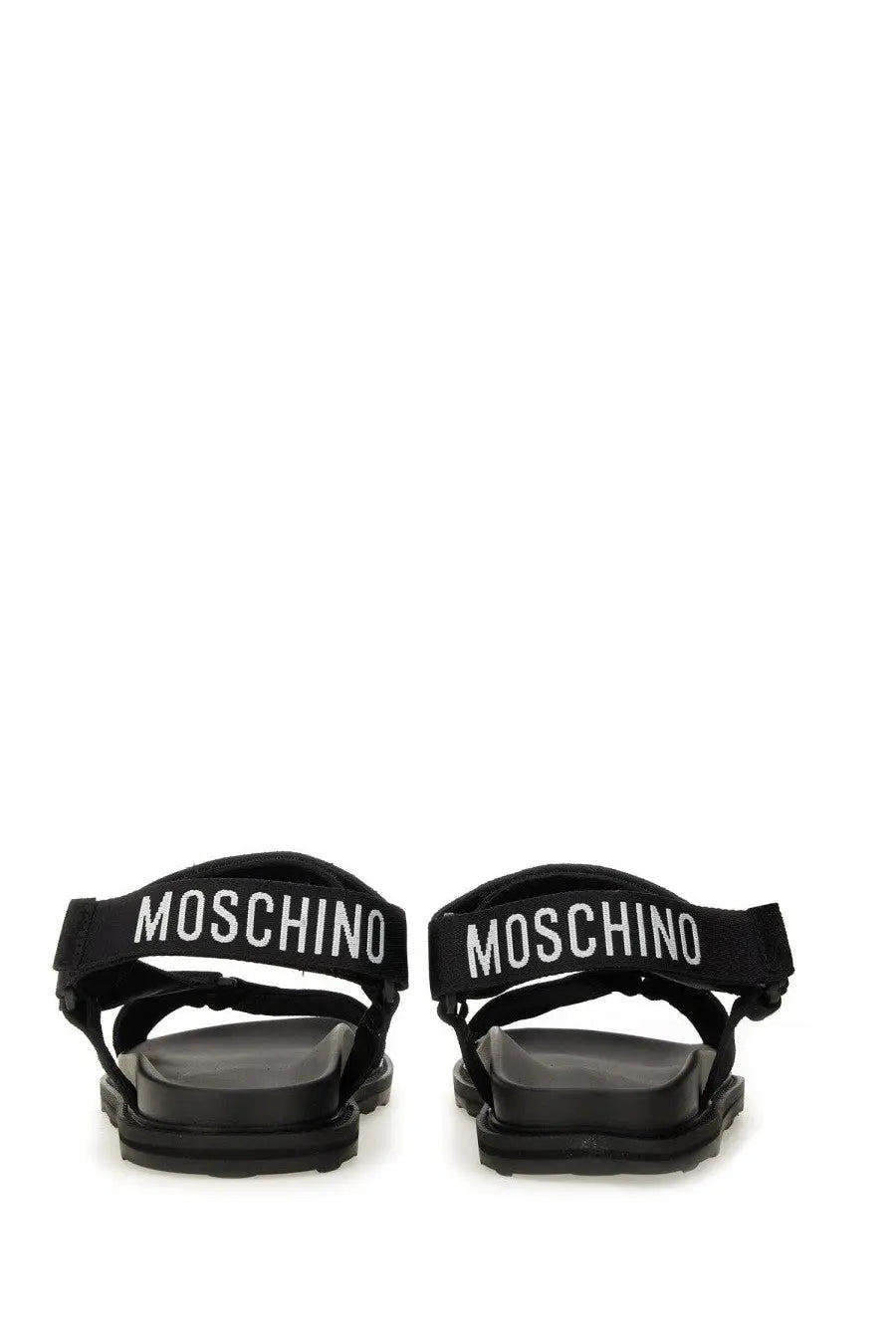 Moschino men’s sandal black featuring black sandals with white logo straps and chunky rubber sole