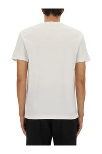 Moschino men’s white cotton t-shirt with a simple crew neck and short sleeves on a plain background