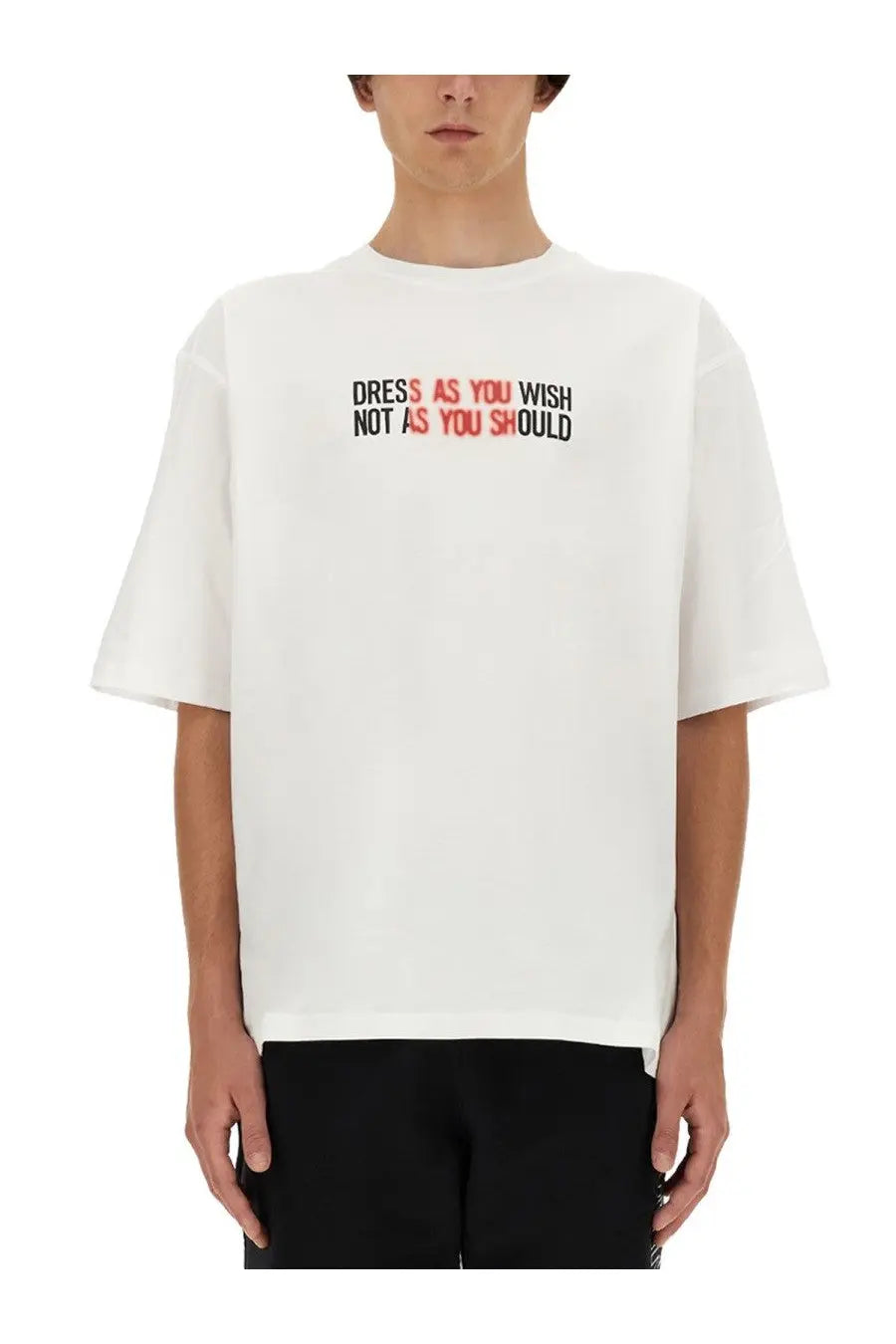 Moschino men’s white oversized cotton t shirt with short sleeves and bold black and red text graphic on chest