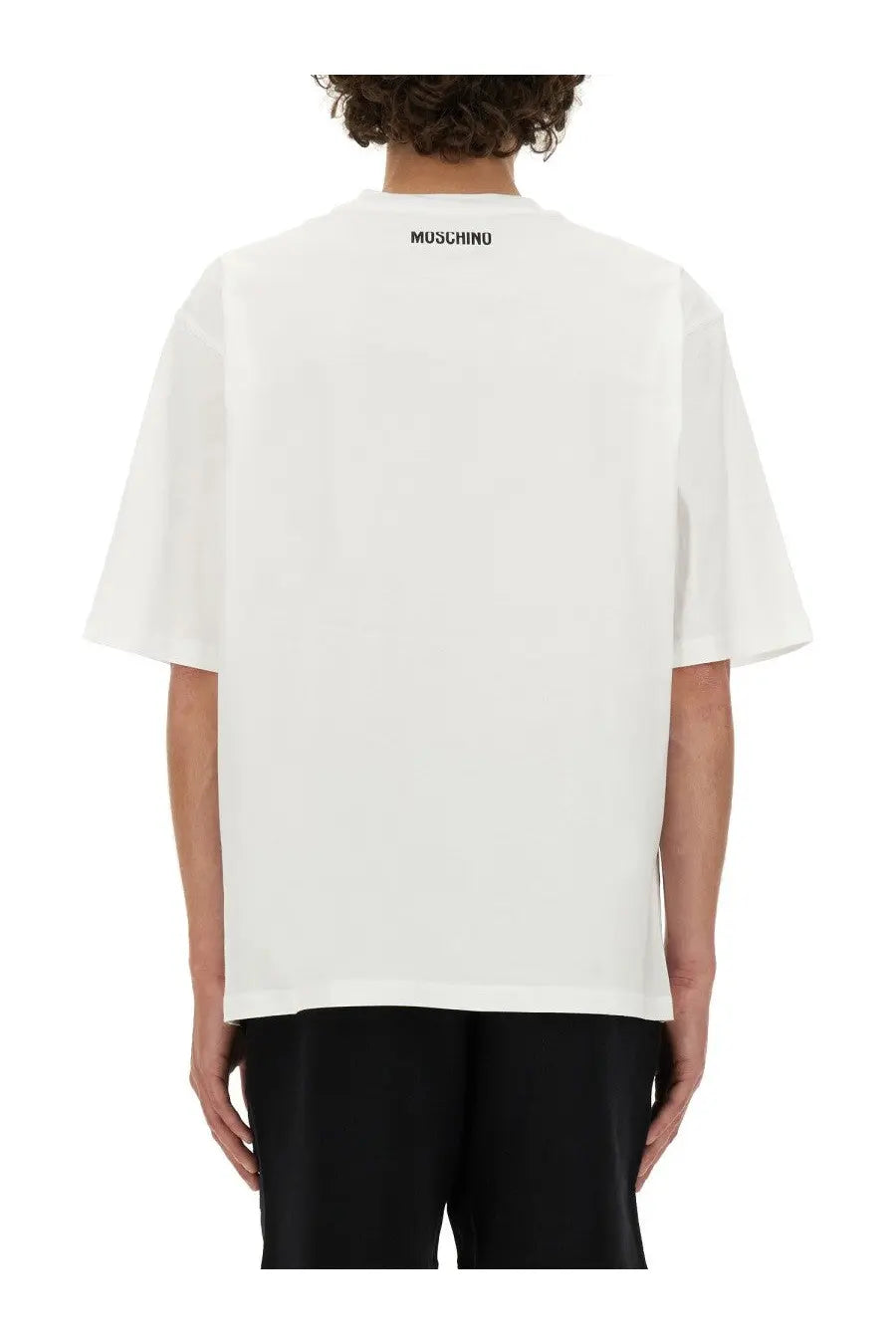 Moschino men’s white oversized t-shirt with black logo at the neckline made from soft cotton fabric