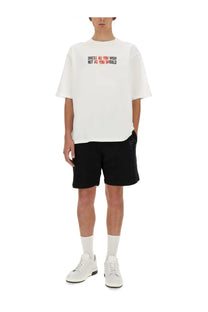 Moschino men’s white oversized cotton t-shirt with bold red and black dress as you wish not as you should graphic