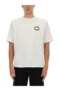 Moschino men’s white t-shirt with a black circular logo on the chest made of soft cotton material