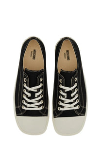 Moschino men’s sneaker edge black low-top canvas sneaker with white laces rubber toe cap and logo insole