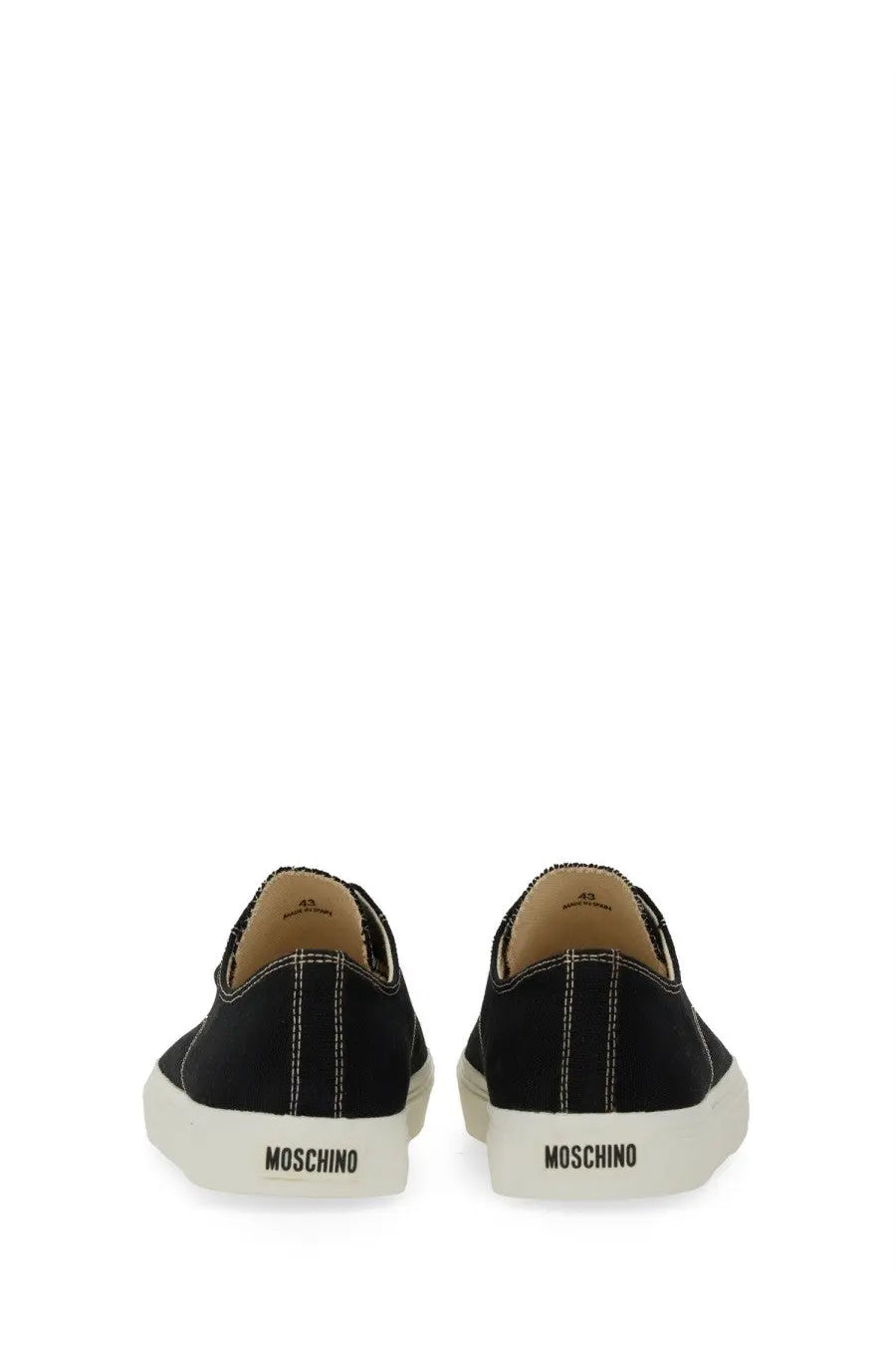 Moschino men’s sneaker edge black slip-on sneakers with white rubber soles and contrasting stitching
