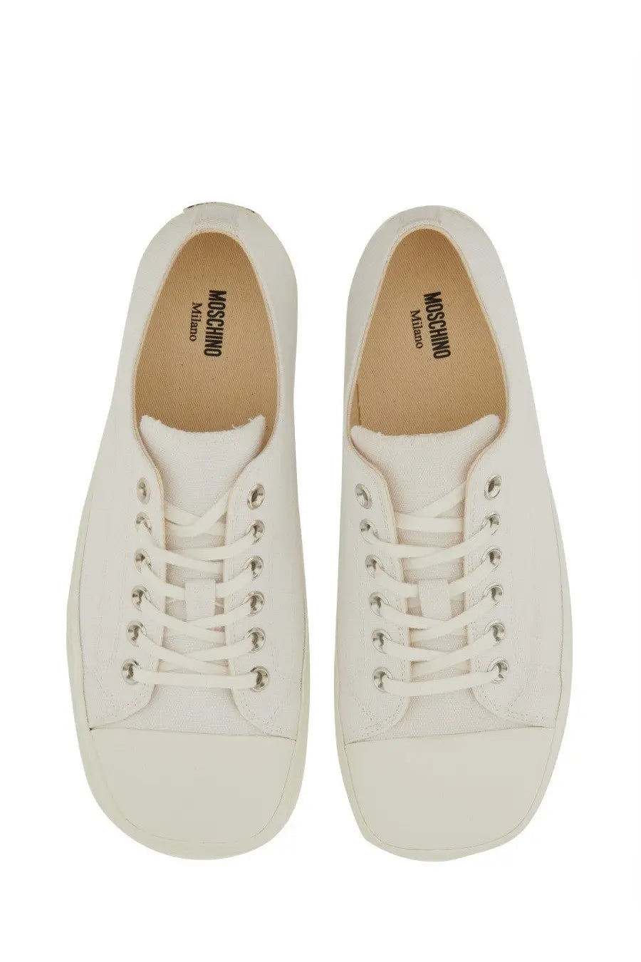 Moschino men’s white canvas low-top sneakers with silver eyelets and minimalist design for casual wear