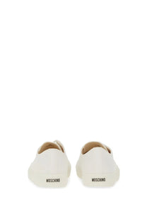 Back view of white leather moschino men’s sneaker edge with minimalist design and embossed brand name on heel
