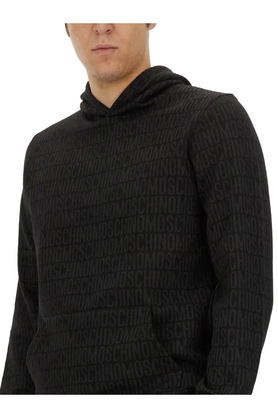 Black Moschino men’s sweatshirt hoodie with embossed repeating logo pattern across the fabric