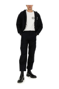 Moschino men’s black zip-up hoodie with subtle chest logo made from comfortable sweatshirt material