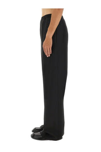 Moschino men’s black wool canvas pants with wide-leg cut smooth fabric and elastic waistband