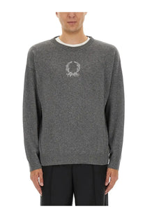 Moschino men’s grey wool and cashmere pullover with gray textured knit and white embroidered laurel wreath logo on chest