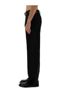 Moschino men’s black wool tailored trousers with a sleek straight-leg cut and matching belt