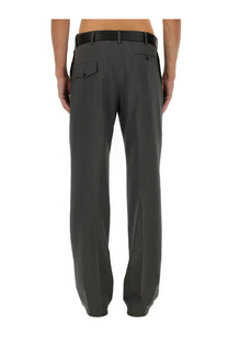 Dark gray tailored moschino men wool pants with sleek straight-leg cut and subtle waistband pleats