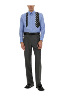 Light blue long-sleeved button-up shirt with black polka-dot tie suspenders paired with Moschino men’s grey wool pants