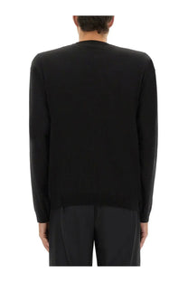 Moschino men’s black crew neck pullover knit sweater made of wool and silk for stylish cold weather wear