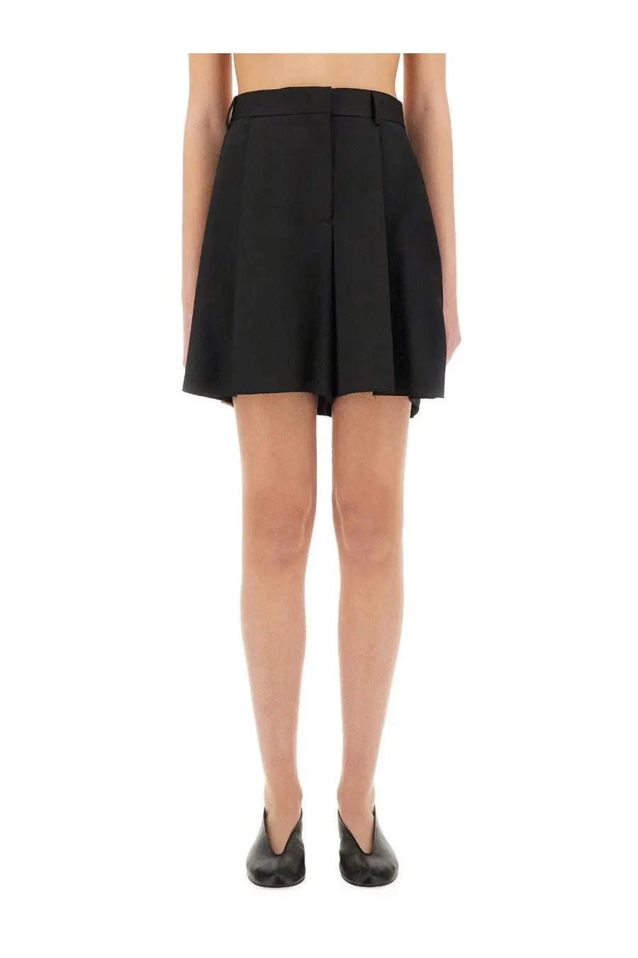 Moschino women’s black wool asymmetrical shorts with a structured waistband and tailored pleated mini skirt design