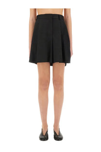 Black pleated mini skirt with structured waistband and tailored lines from moschino womens asymmetrical wool shorts black