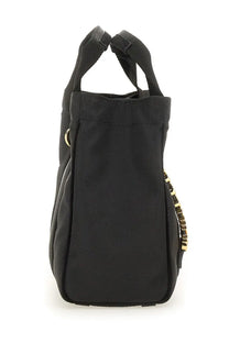 Moschino women’s black canvas tote bag with gold-tone hardware and zipper pull for stylish everyday use