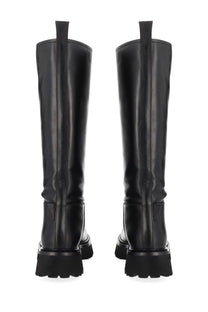 Moschino women’s black leather knee-high boots with chunky sole and back pull tabs shown from the back side