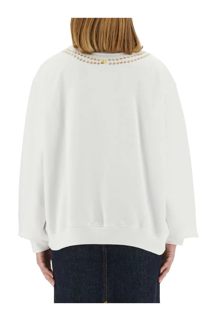 Moschino women’s white oversized sweatshirt with decorative beaded neckline and ribbed cuffs in cotton blend material