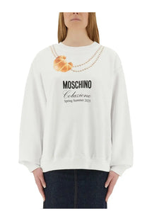 White Moschino women’s sweatshirt with golden croissant and pearl necklace print for spring summer 2025 collection
