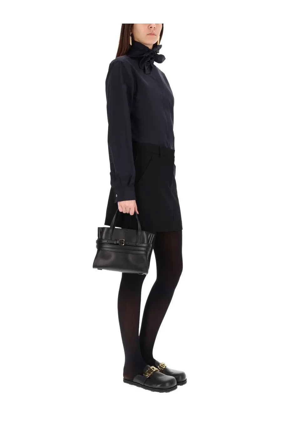 Black leather handbag with structured design and top handle complementing moschino women’s cotton poplin jacquard shirt black