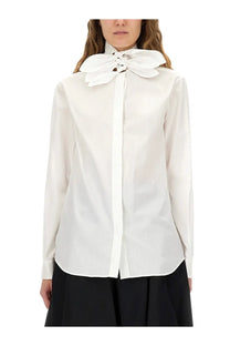 Moschino women’s white cotton poplin jacquard shirt with a prominent bow at the collar and subtle vertical ribbing