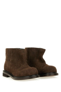 Moschino women’s Crust Olivia boot brown ankle boots in brown suede with matte finish and black rubber soles