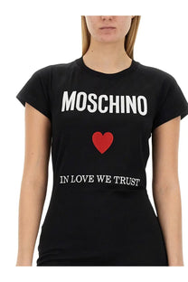 Moschino women’s black t-shirt with bold white lettering and red heart graphic in cotton fabric for casual wear