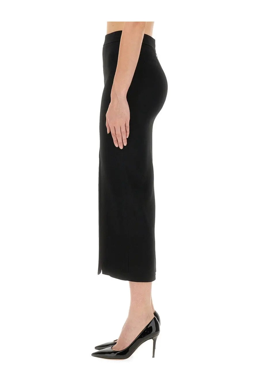 Black high-waisted midi skirt by Moschino featuring a sleek form-fitting silhouette and subtle side slit